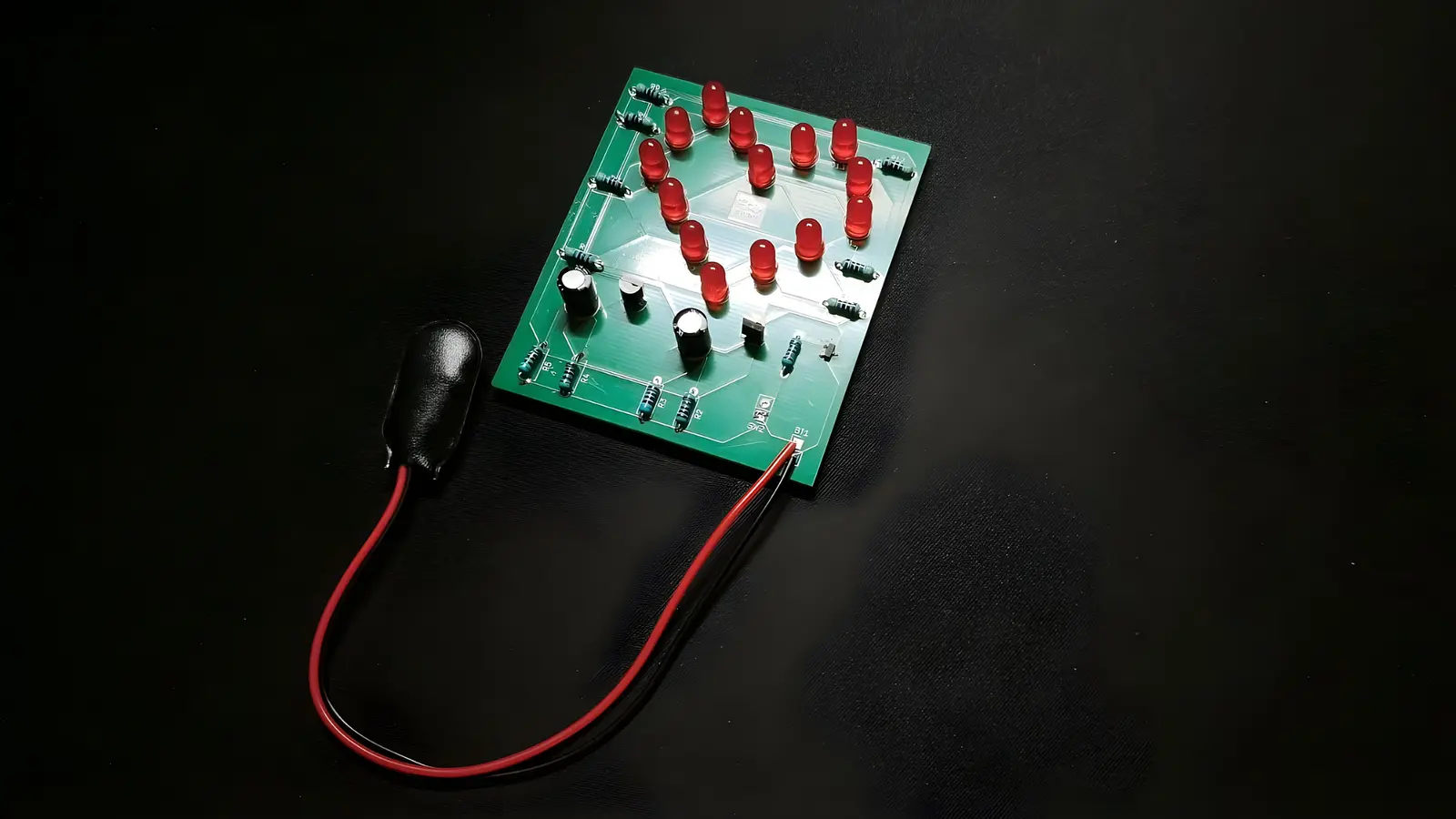 St. Valentine gift card with glowing LED's in a heart shape. banner